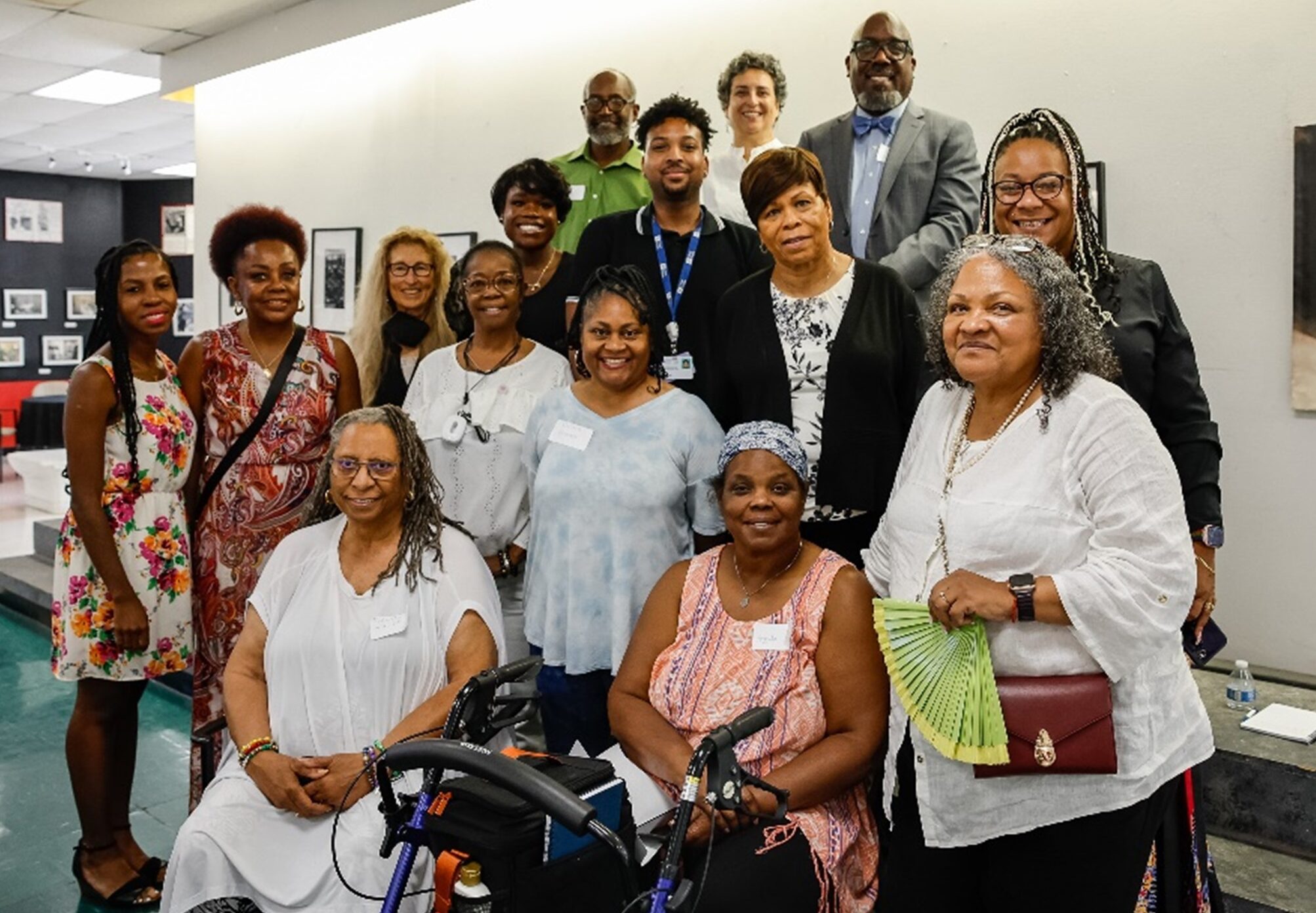 A group of women smile at the camera at an event.